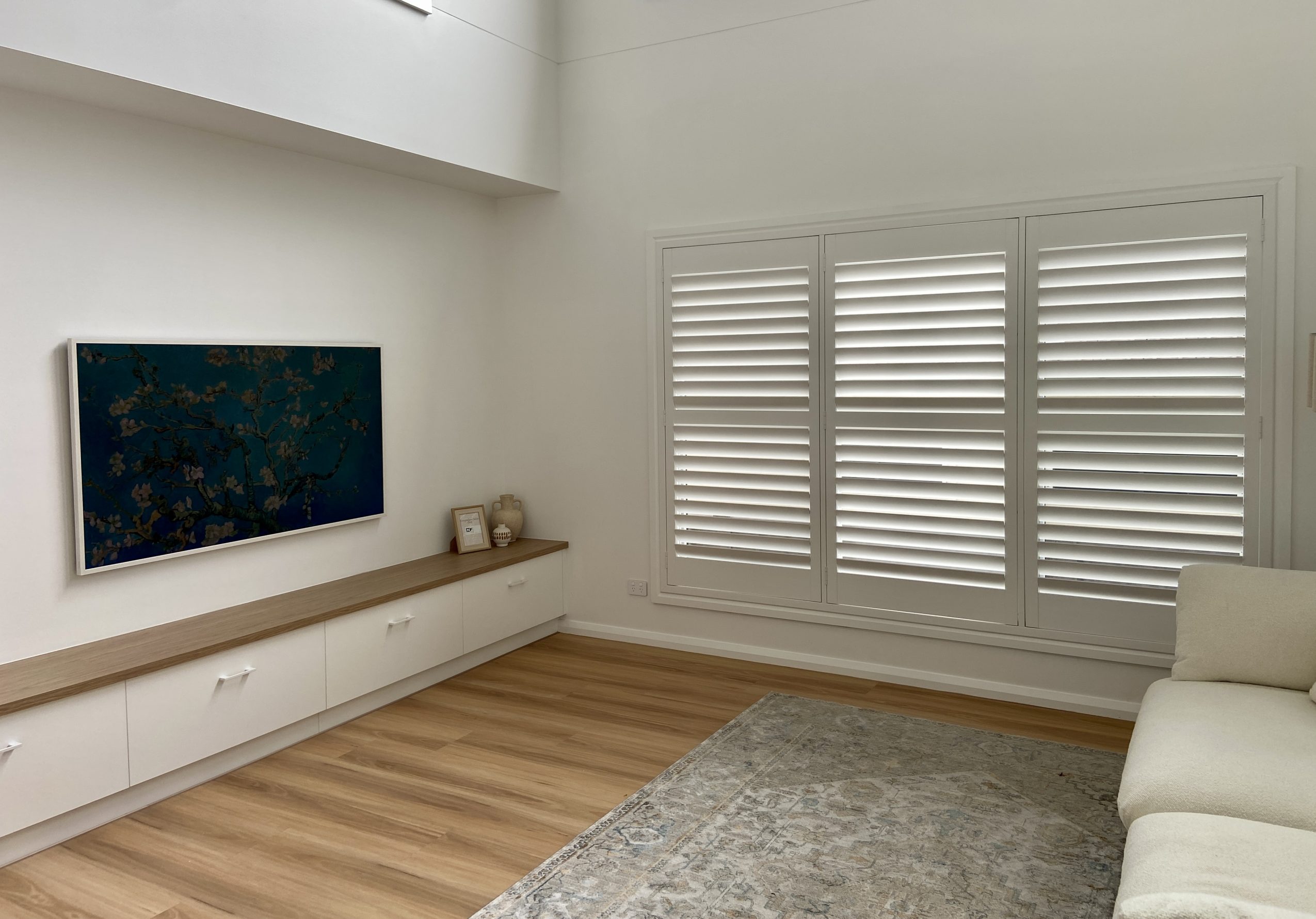 Layered sheer and blockout curtains for privacy in a Warners Bay home
